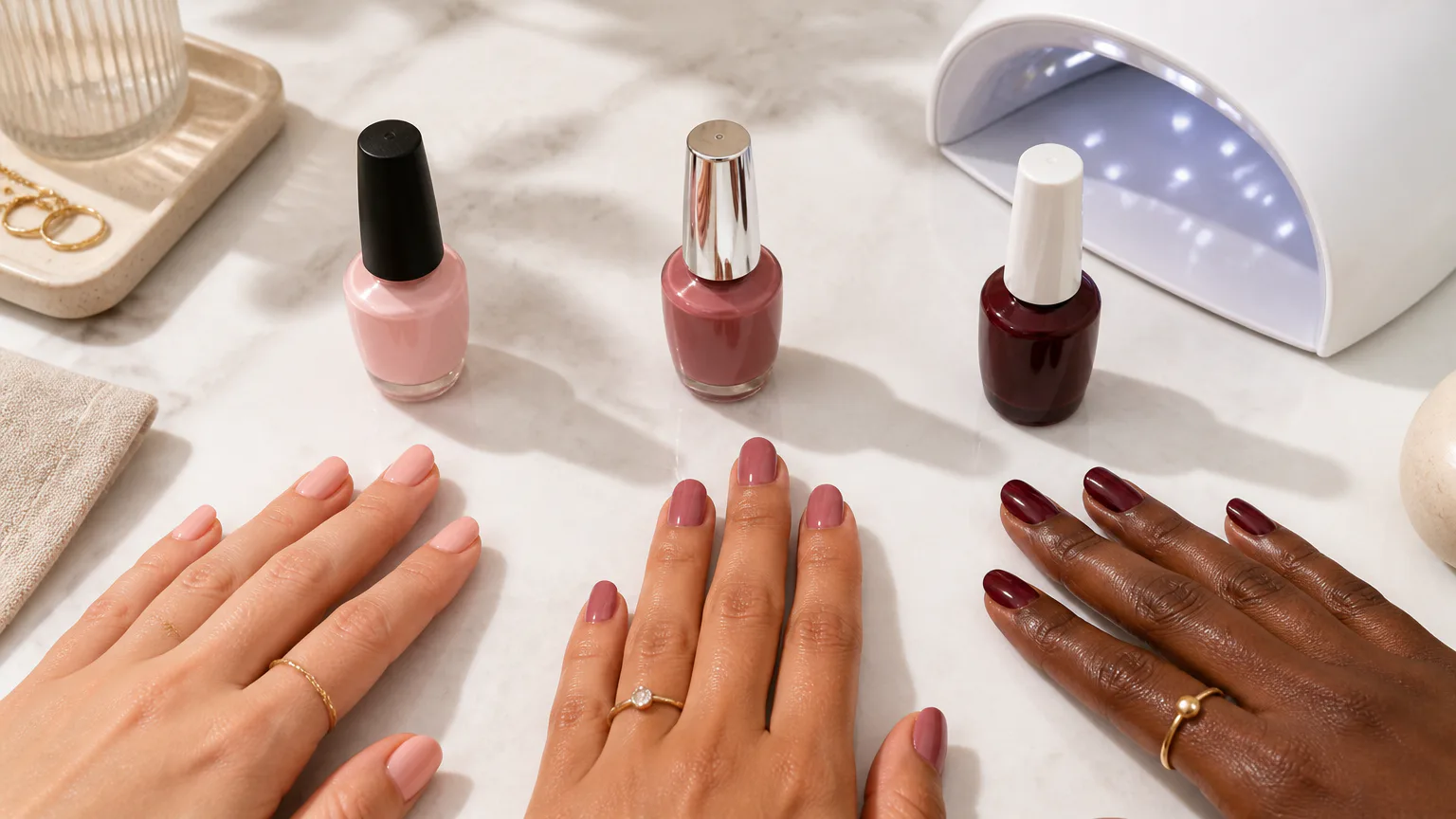 Hands with different nail polish shades