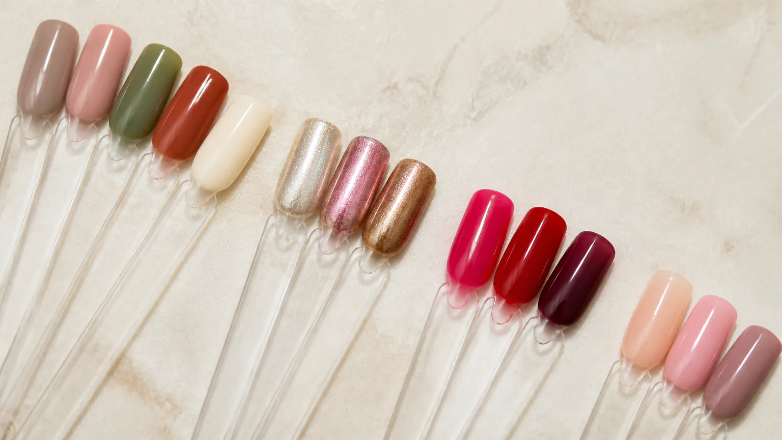 Colorful nail polish swatches on clear sticks