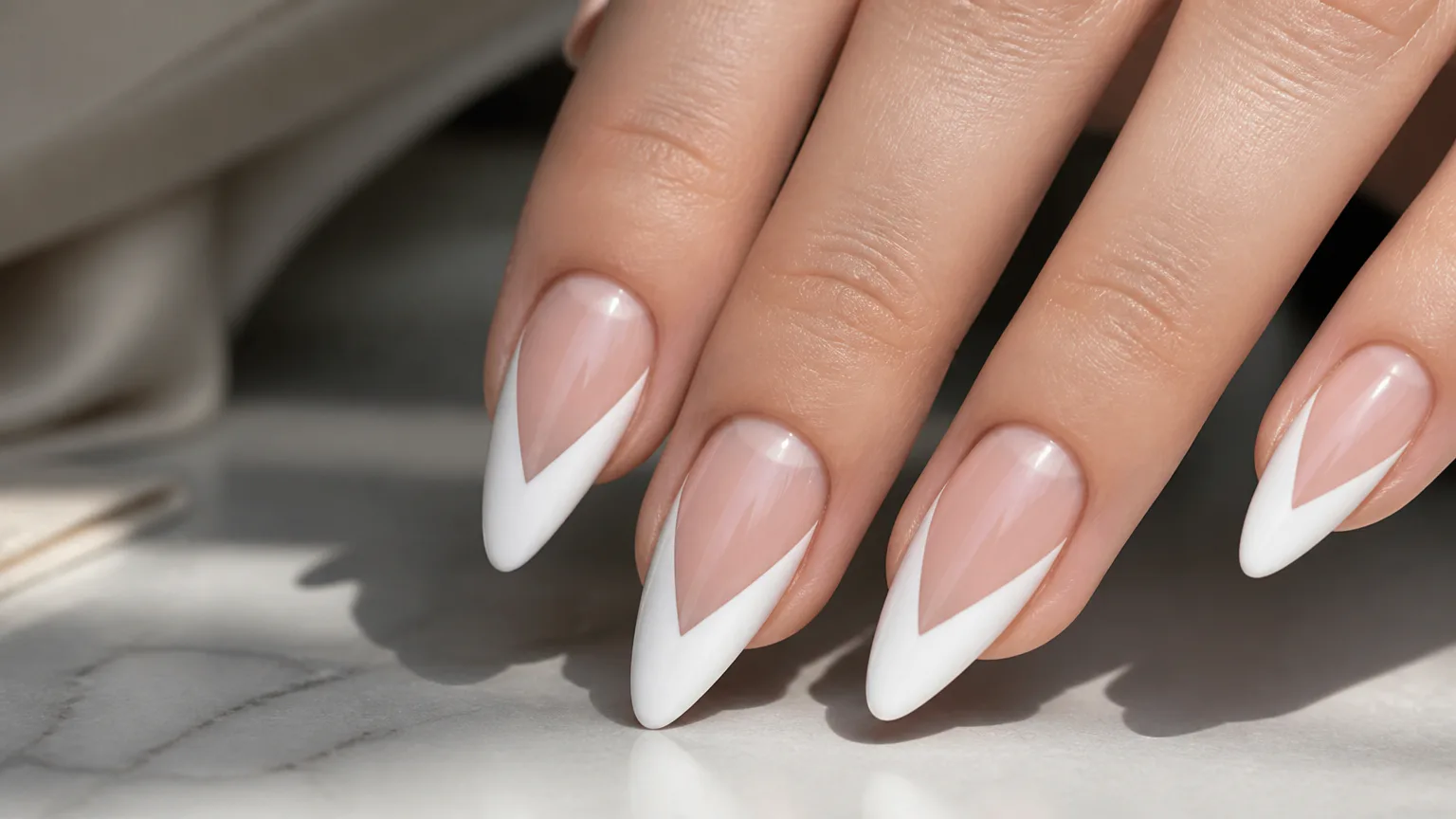Close-up of elegant French tip nails