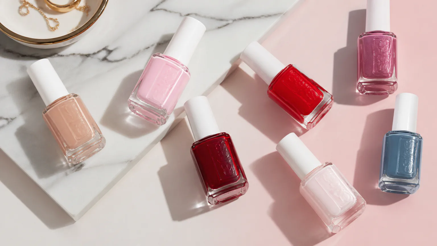 Essie nail polish bottles in assorted colors