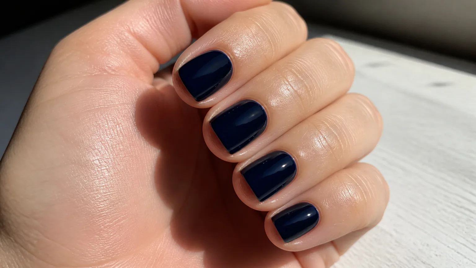 Essie Gel Couture Caviar Bar glossy navy nails