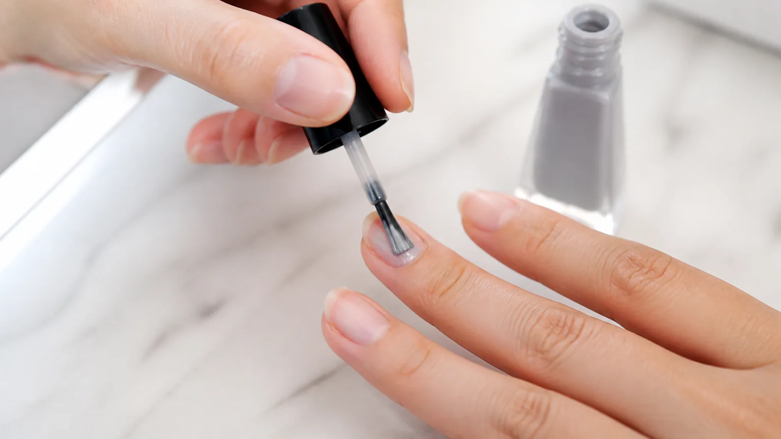 Sally Hansen Insta-Dri brush application