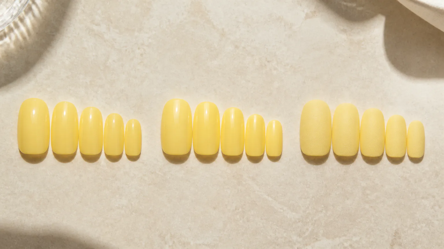 OPI Sunny Bunny Rows of yellow artificial nail tips